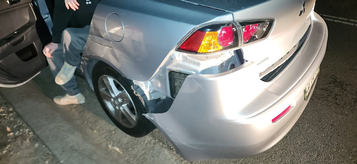Mitsubishi Lancer rear collision damage